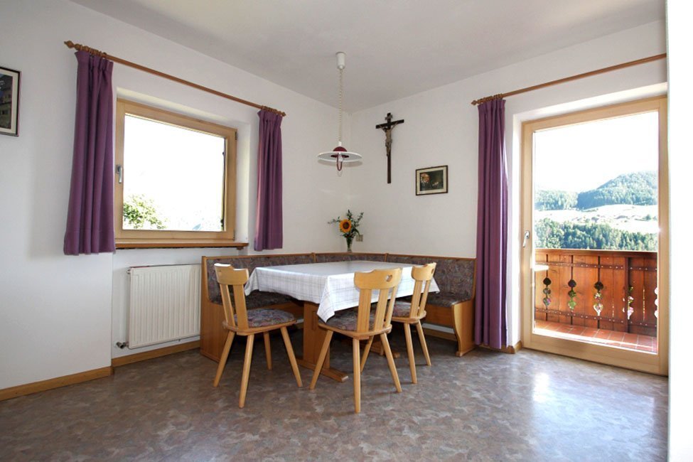 Apartment 2 — dining area and balcony